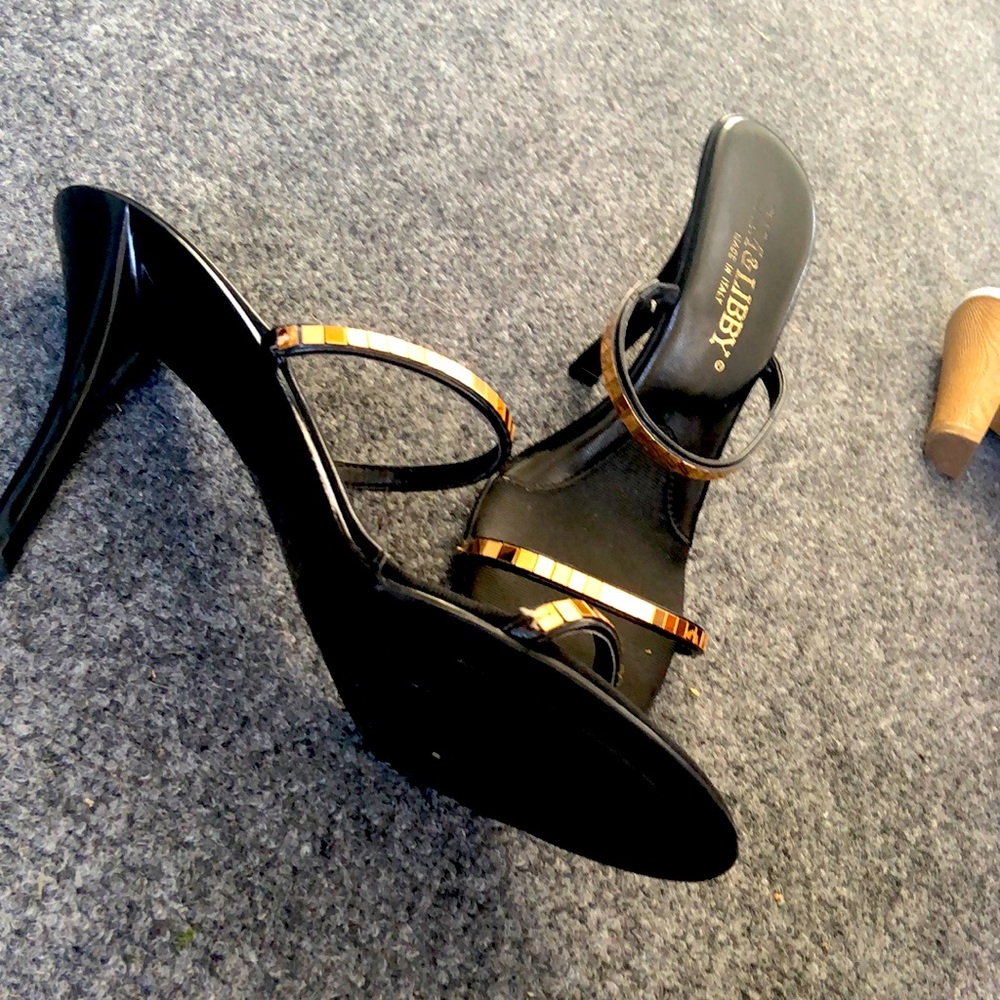 Double strap gold and black stiletto sandals